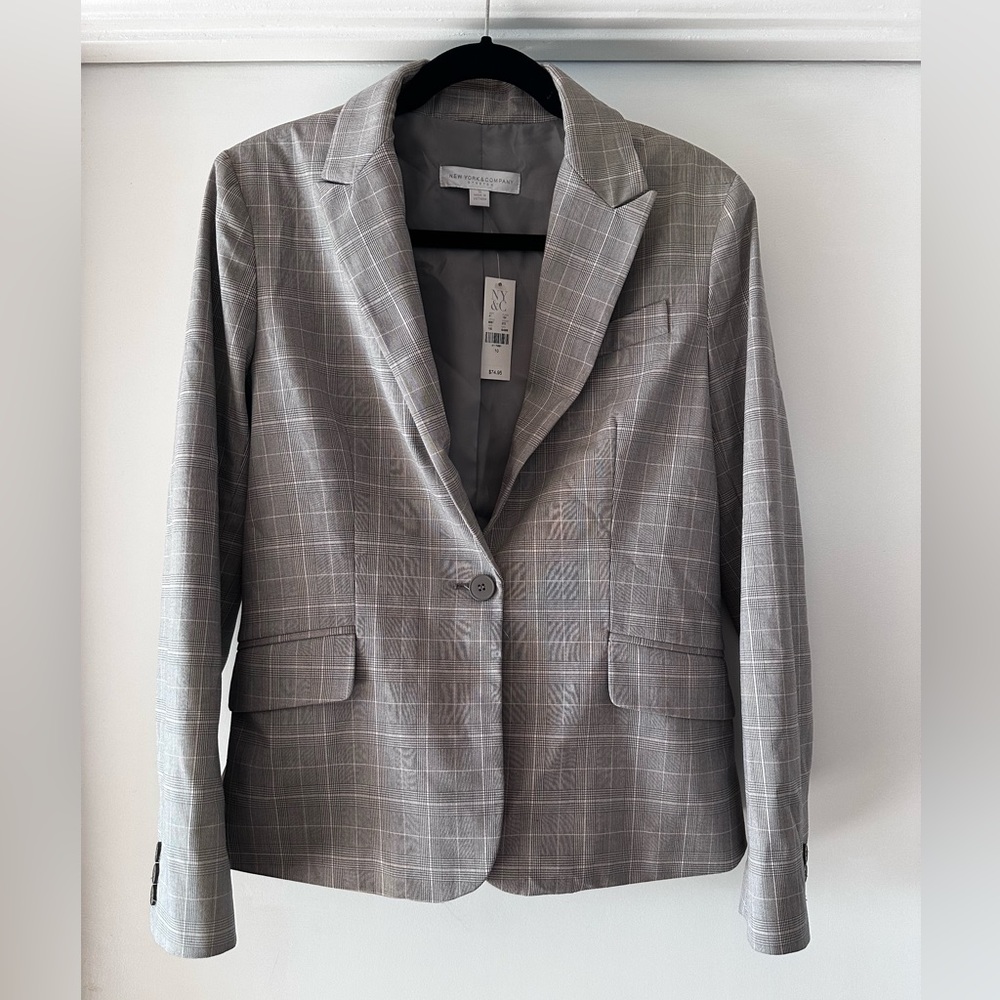 Women’s plaid jacket and high waist pencil skirt